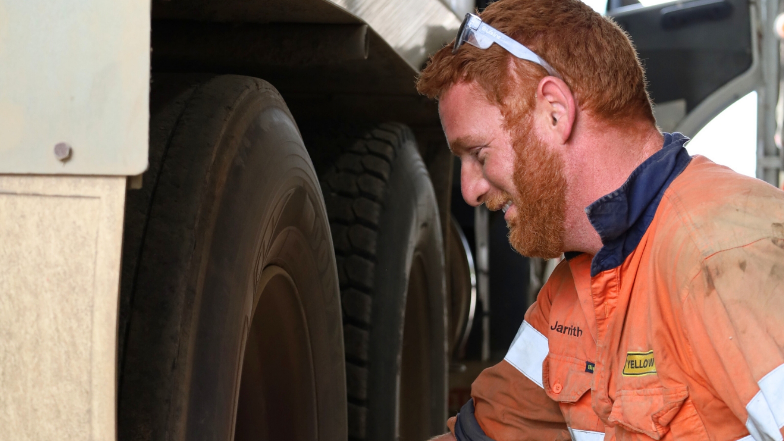 Heavy vehicle Mechanic inspecting truck